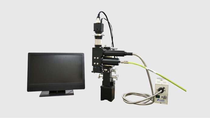 Photo: Focusing heads and optical fiber